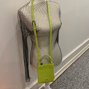 Tumi Green Crossbody Bag with Minimalist Design